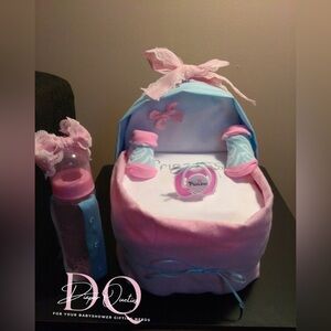 Pink and blue baby girl baby shower diaper bassinet